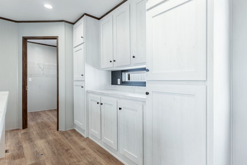 The SELECT 16602A Kitchen. This Manufactured Mobile Home features 2 bedrooms and 2 baths.