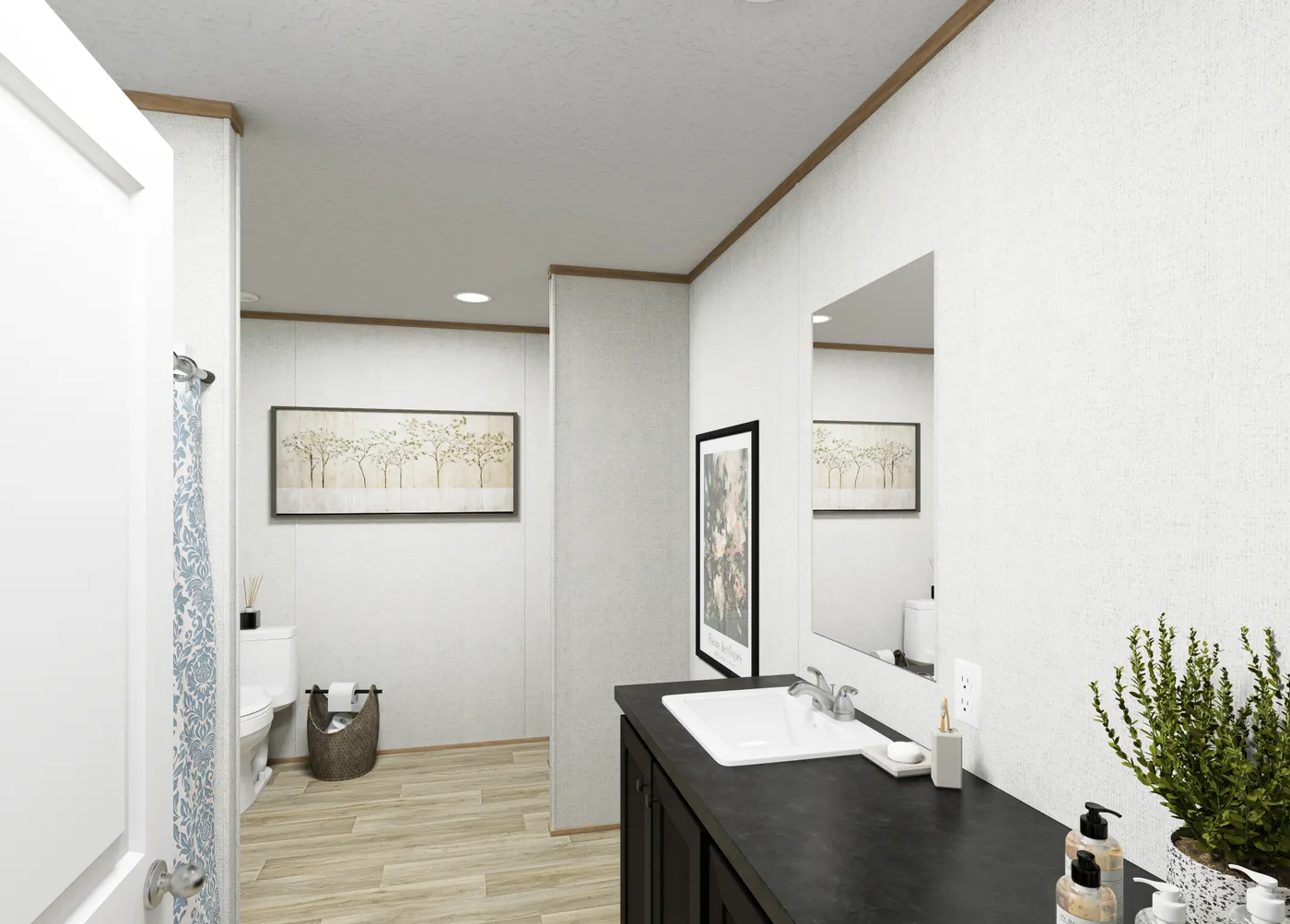 The ASPIRE Primary Bathroom. This Manufactured Mobile Home features 3 bedrooms and 2 baths.