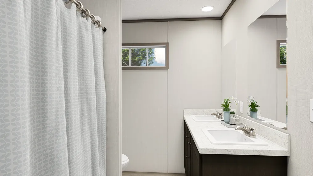 The ULTRA PRO HERCULES 28X68 3BR Guest Bathroom. This Manufactured Mobile Home features 3 bedrooms and 2 baths.