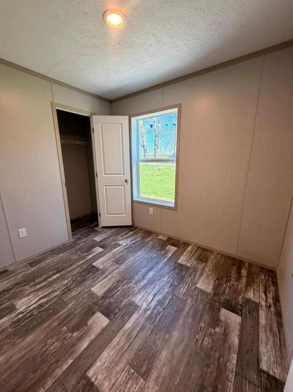 The JEFFERSON Guest Bedroom. This Manufactured Mobile Home features 3 bedrooms and 2 baths.