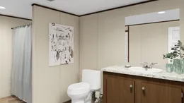 The TRIUMPH Primary Bathroom. This Manufactured Mobile Home features 5 bedrooms and 3 baths.