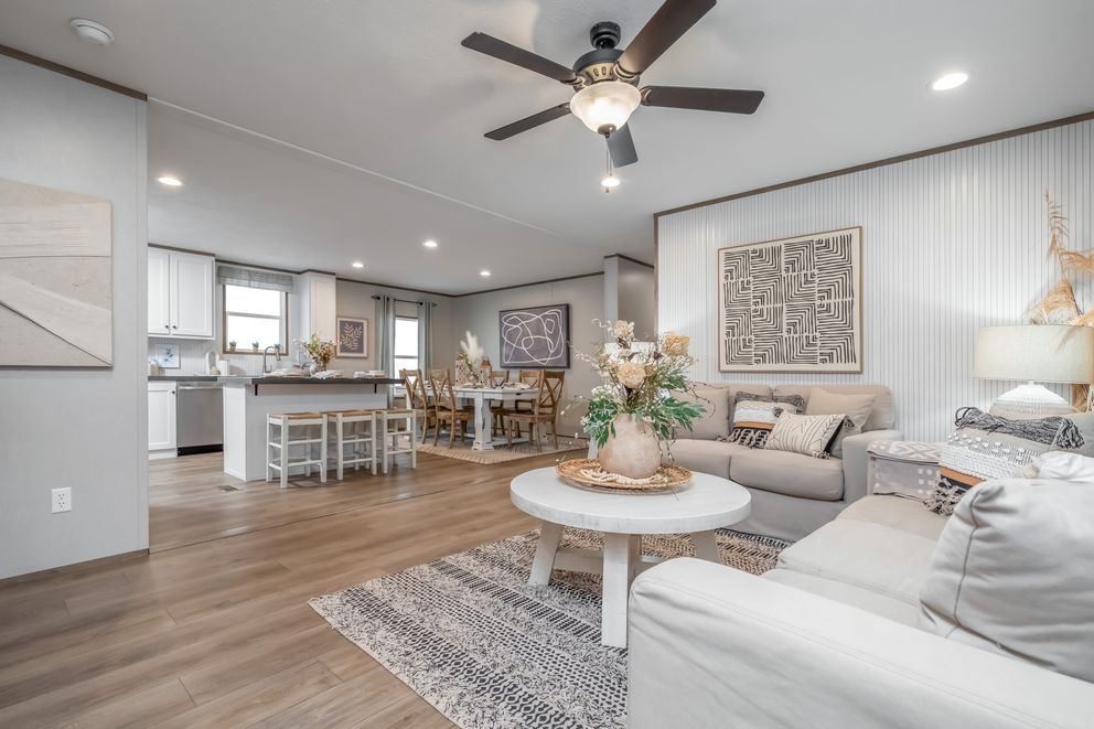 The VISTA Living Room. This Manufactured Mobile Home features 3 bedrooms and 2 baths.
