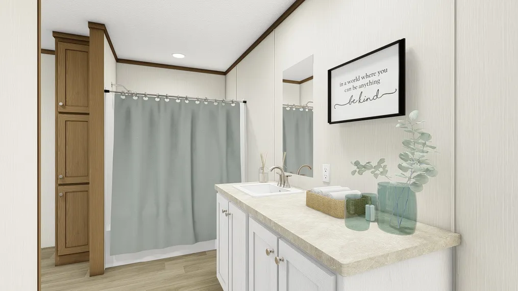 The THE REVEAL Primary Bathroom. This Manufactured Mobile Home features 3 bedrooms and 2 baths.