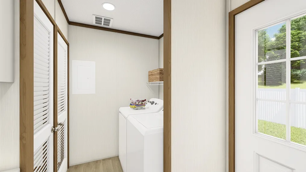 The DYNAMIC Utility Room. This Manufactured Mobile Home features 3 bedrooms and 2 baths.