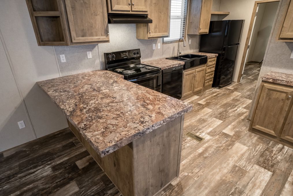 The ANNIVERSARY CHOICE Exterior. This Manufactured Mobile Home features 3 bedrooms and 2 baths.
