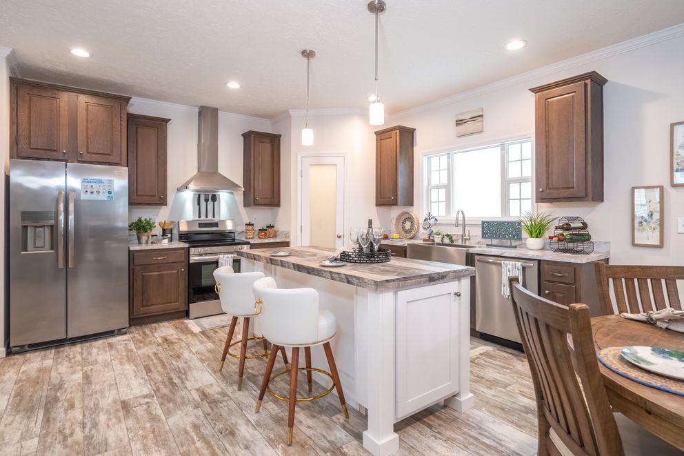 The 1444 CAROLINA Kitchen. This Manufactured Mobile Home features 4 bedrooms and 2 baths.