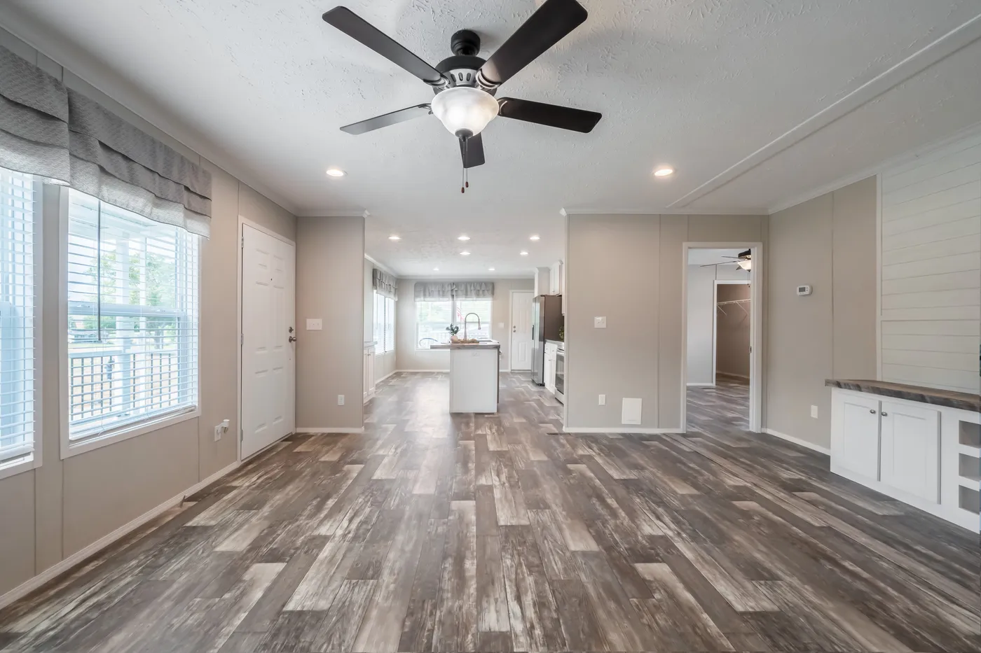 The NORTHSHORE Living Room. This Manufactured Mobile Home features 3 bedrooms and 2 baths.