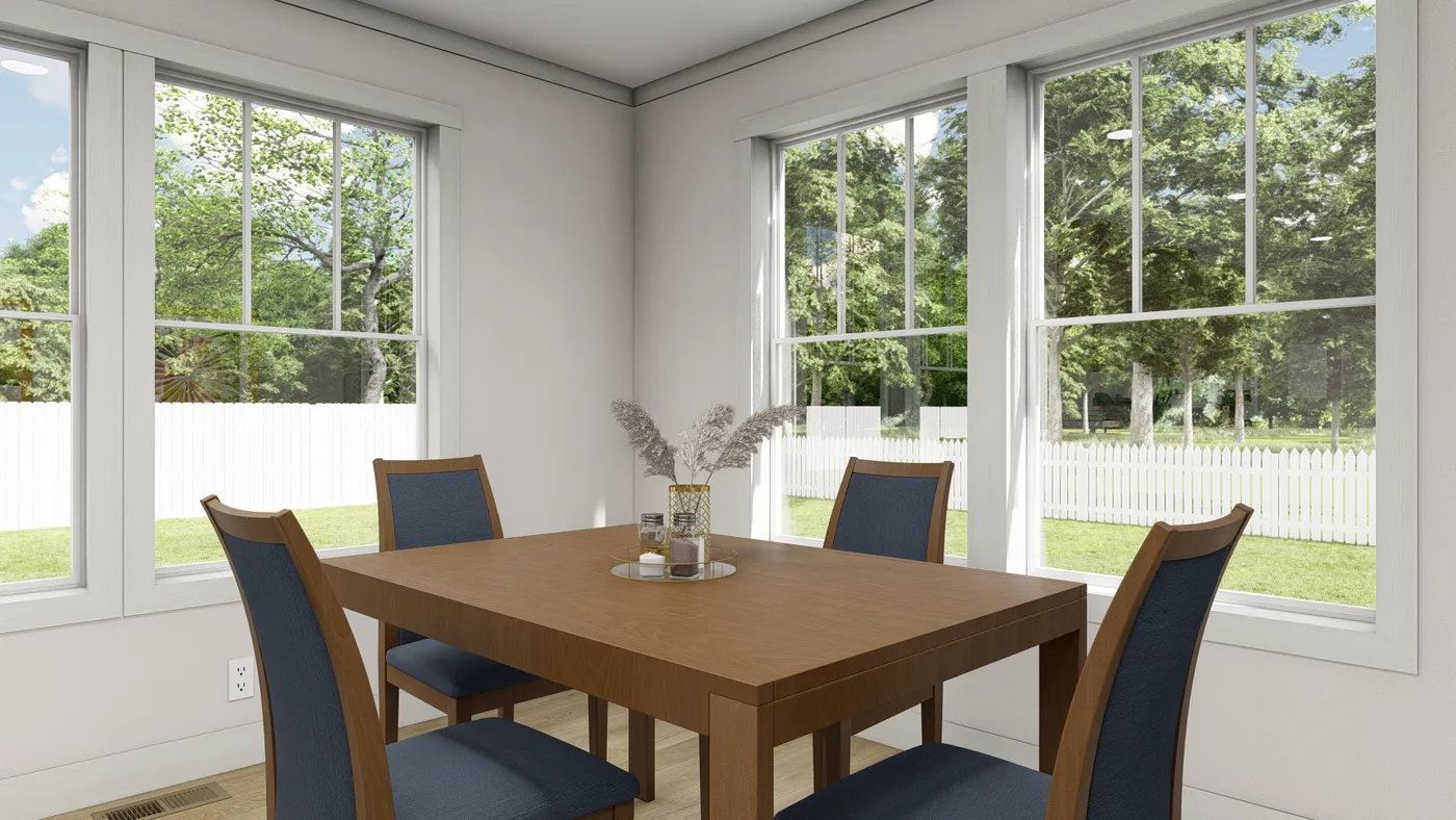 The WHOLE LOTTA LOVE Dining Area. This Manufactured Mobile Home features 3 bedrooms and 2 baths.