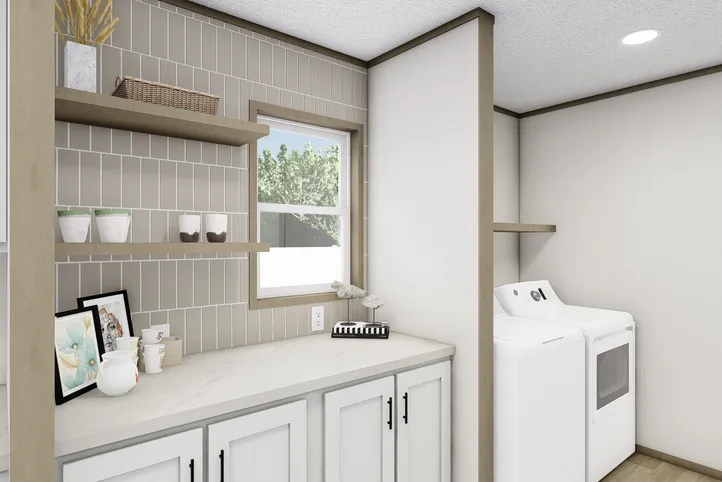 The MOROCCO Utility Room. This Manufactured Mobile Home features 4 bedrooms and 2 baths.