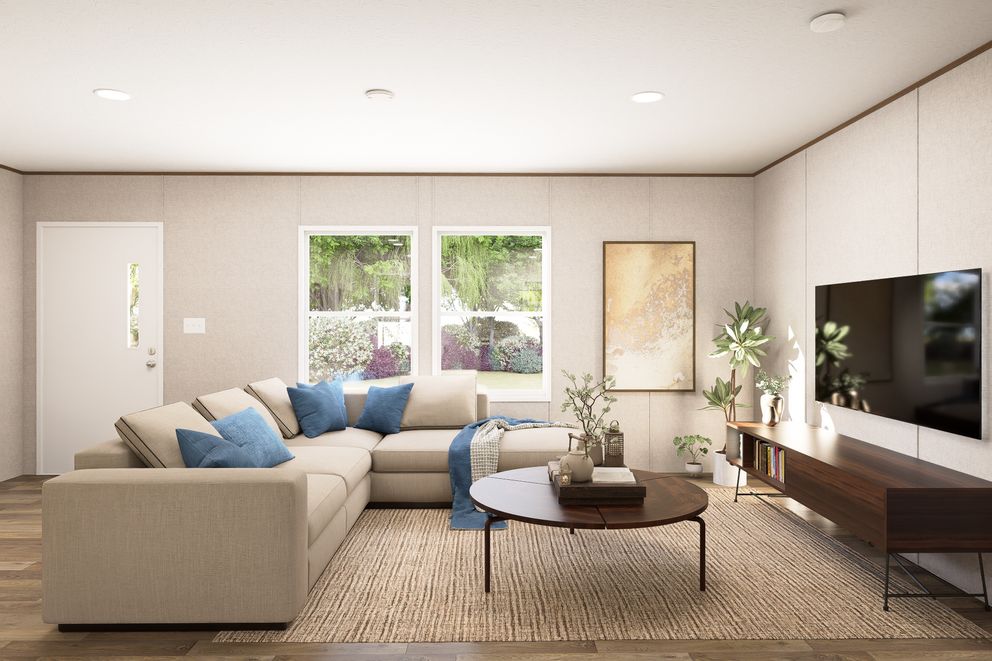 The MAPLE Living Room. This Manufactured Mobile Home features 3 bedrooms and 2 baths.
