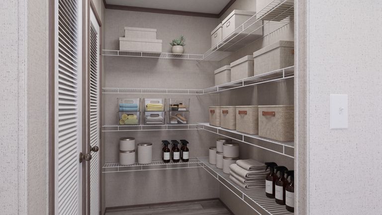 The THE MOUNTAINEER 60 Storage. This Manufactured Mobile Home features 3 bedrooms and 2 baths.