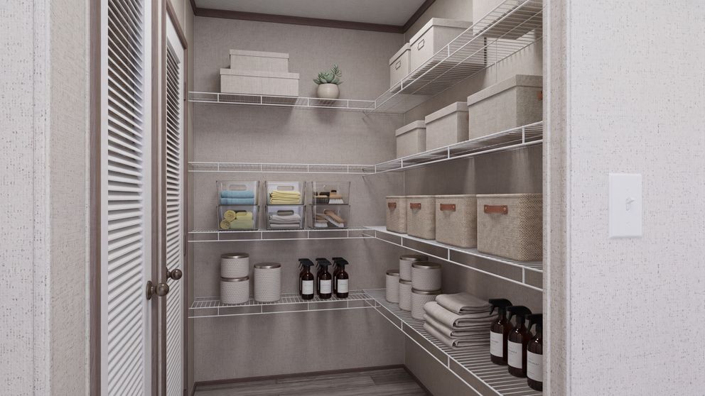 The THE MOUNTAINEER 60 Storage. This Manufactured Mobile Home features 3 bedrooms and 2 baths.