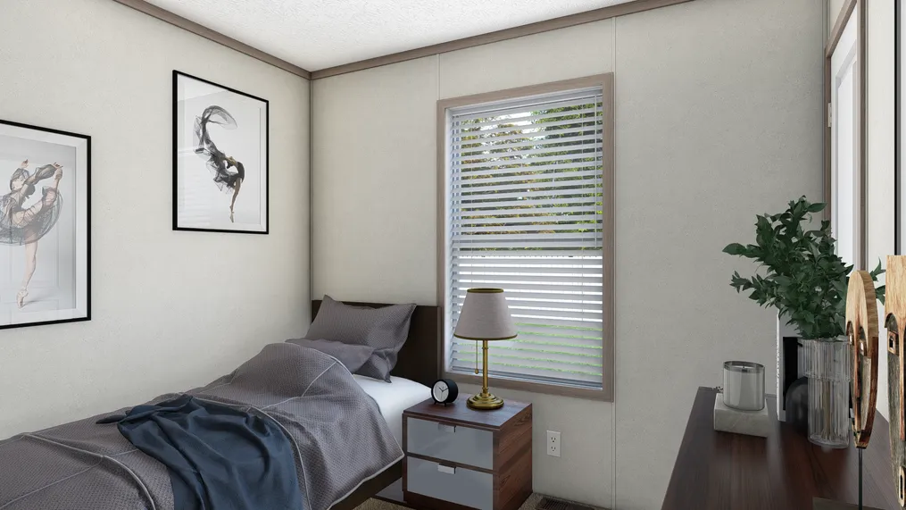 The 7616-4700 THE PULSE Guest Bedroom. This Manufactured Mobile Home features 3 bedrooms and 2 baths.