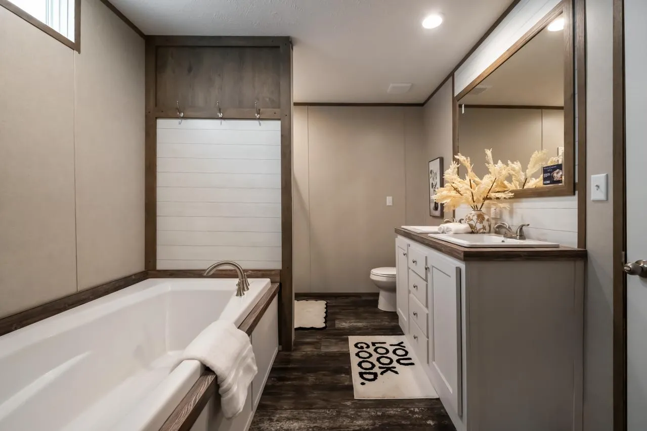 The ANNIVERSARY ENTERTAINER Exterior. This Manufactured Mobile Home features 3 bedrooms and 2 baths.