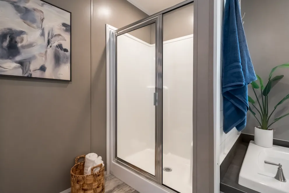 The LIBERTY Primary Bathroom. This Manufactured Mobile Home features 3 bedrooms and 2 baths.