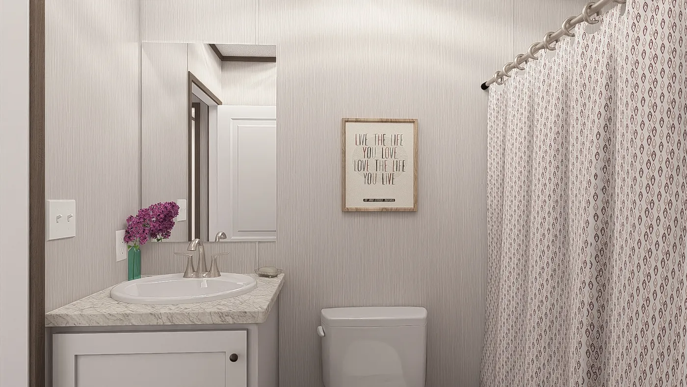The LEGEND ANNIVERSARY 16X76 Guest Bathroom. This Manufactured Mobile Home features 3 bedrooms and 2 baths.
