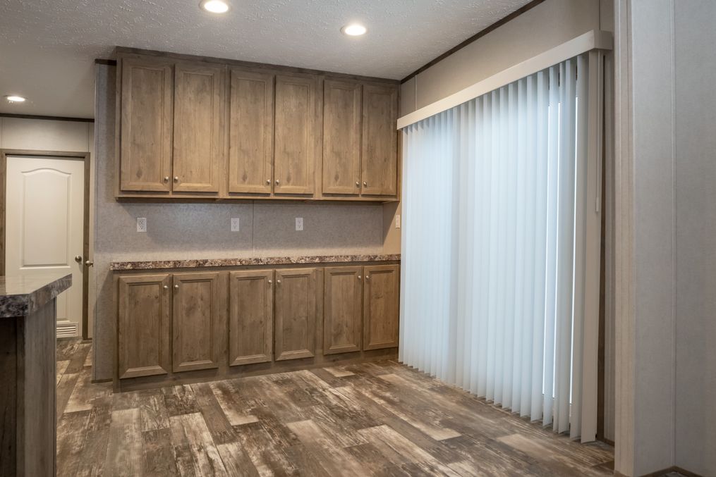 The ANNIVERSARY CHOICE Exterior. This Manufactured Mobile Home features 3 bedrooms and 2 baths.