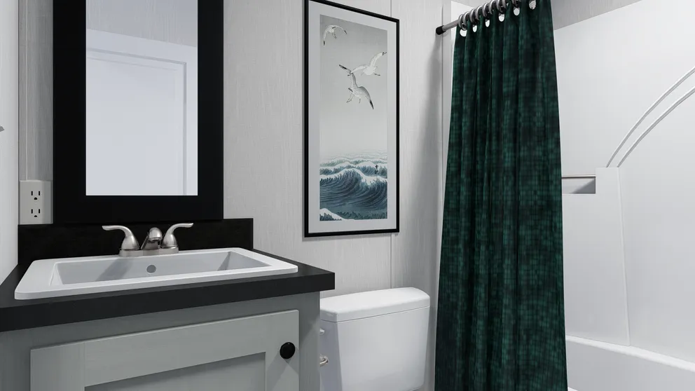 The 6616-4791 THE PULSE Guest Bathroom. This Manufactured Mobile Home features 3 bedrooms and 2 baths.