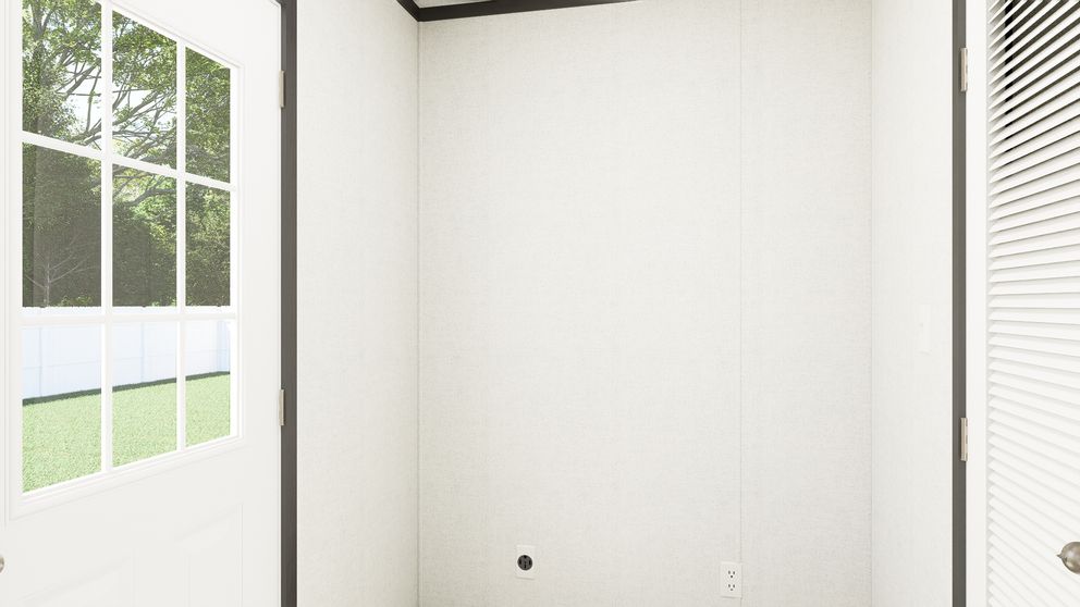 The THE MOUNTAINEER 56 Utility Room. This Manufactured Mobile Home features 3 bedrooms and 2 baths.