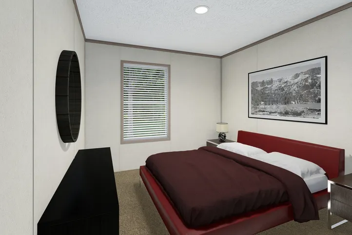 The 5628-E787 THE PULSE Primary Bedroom. This Manufactured Mobile Home features 3 bedrooms and 2 baths.
