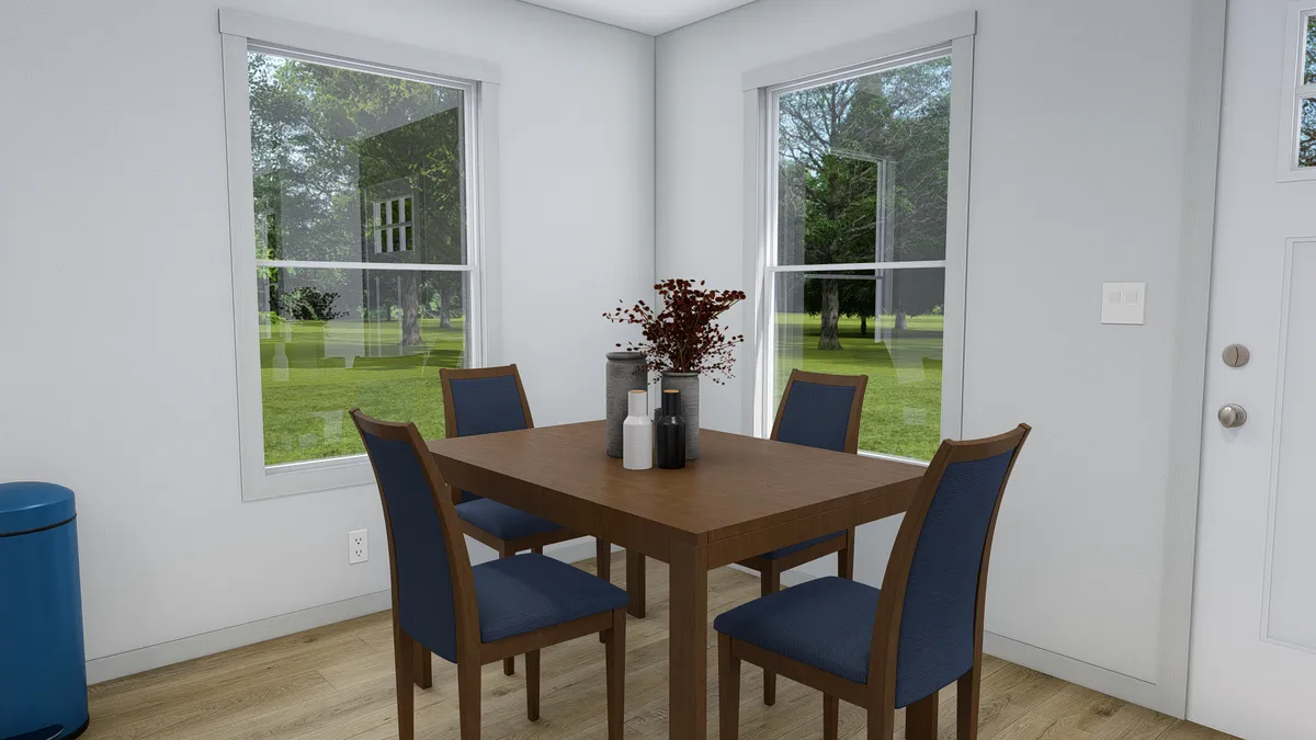 The RISING SUN Dining Area. This Manufactured Mobile Home features 2 bedrooms and 2 baths.