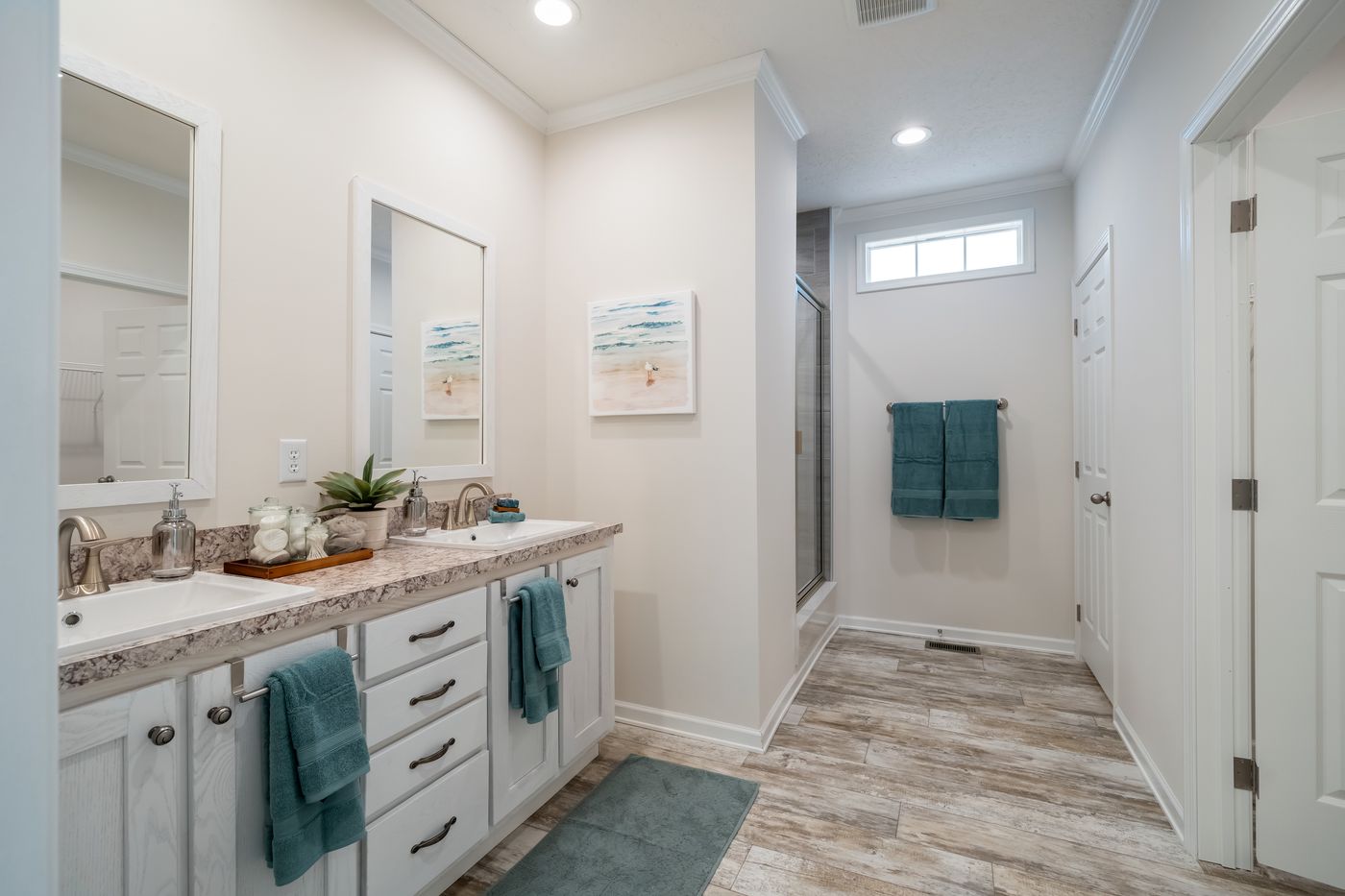 The 2889 THE COTTAGE HUD Primary Bathroom. This Manufactured Mobile Home features 3 bedrooms and 2 baths.