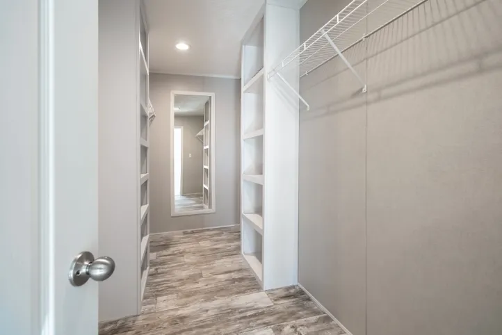 The STELLA Storage. This Manufactured Mobile Home features 3 bedrooms and 2 baths.