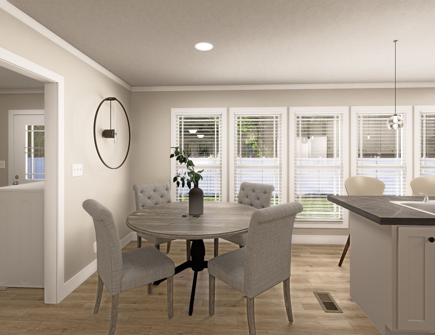 The CLASSIC 60B Dining Area. This Manufactured Mobile Home features 3 bedrooms and 2 baths.