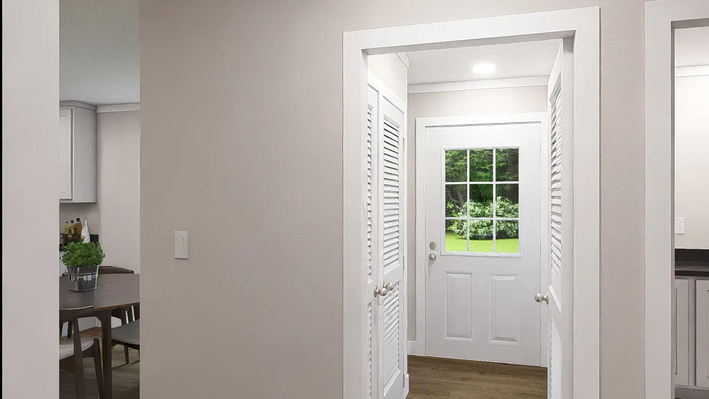 The WONDERFUL WORLD Foyer. This Manufactured Mobile Home features 3 bedrooms and 2 baths.