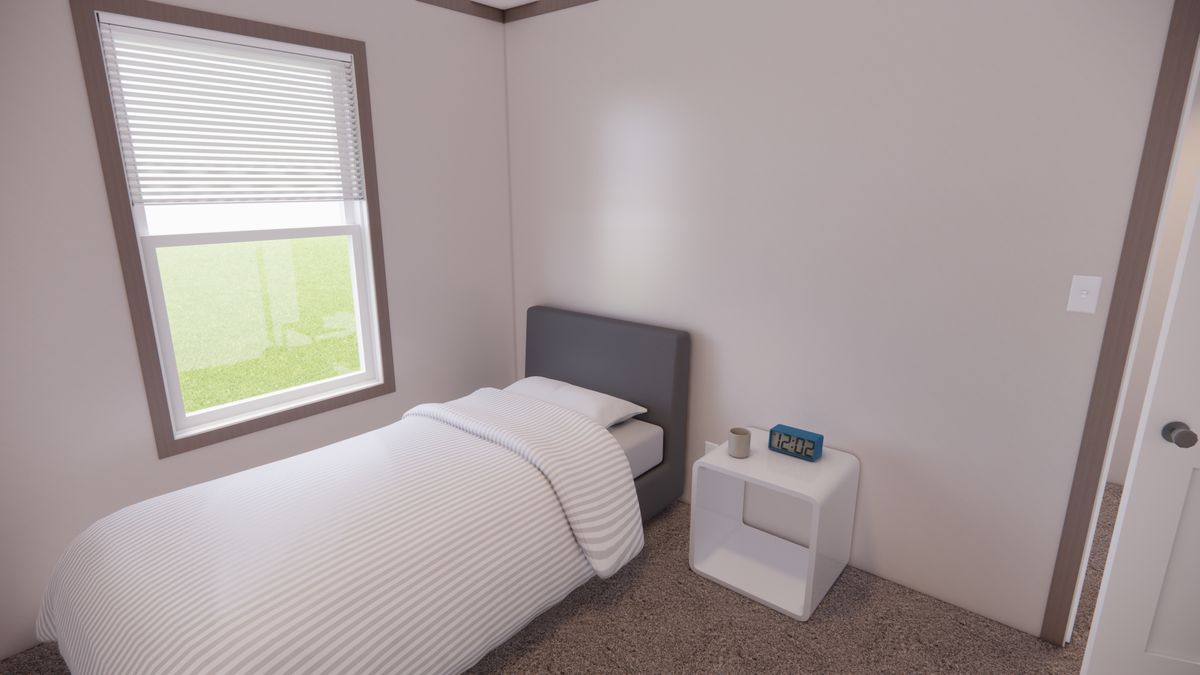The 7216-4200 ADRENALINE Guest Bedroom. This Manufactured Mobile Home features 3 bedrooms and 2 baths.