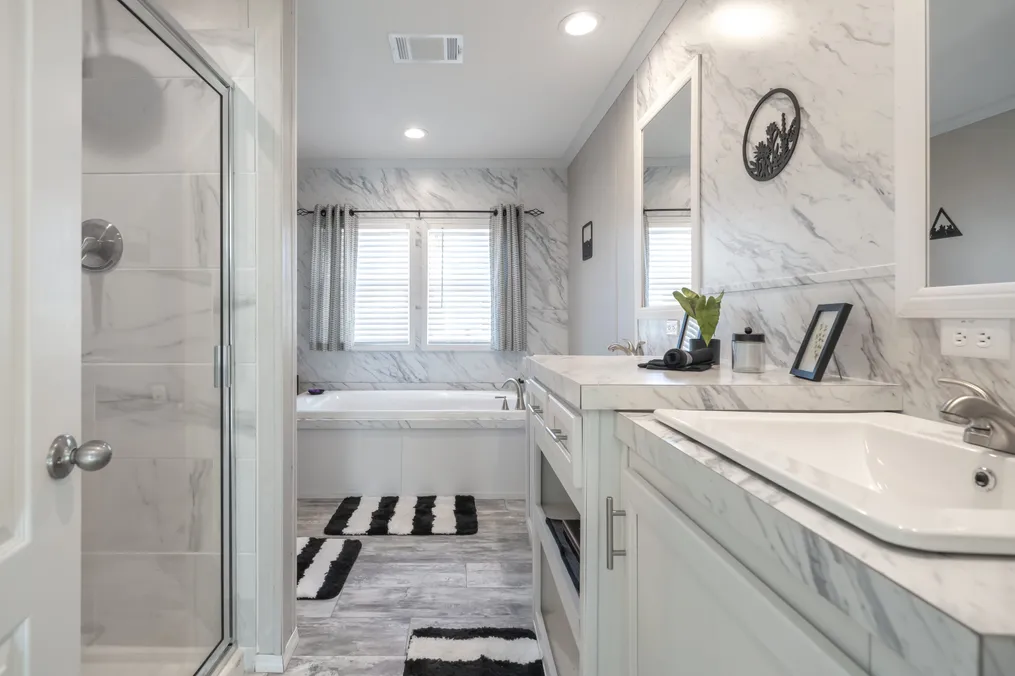 The STELLA Primary Bathroom. This Manufactured Mobile Home features 3 bedrooms and 2 baths.