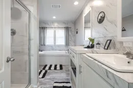 The STELLA Primary Bathroom. This Manufactured Mobile Home features 3 bedrooms and 2 baths.