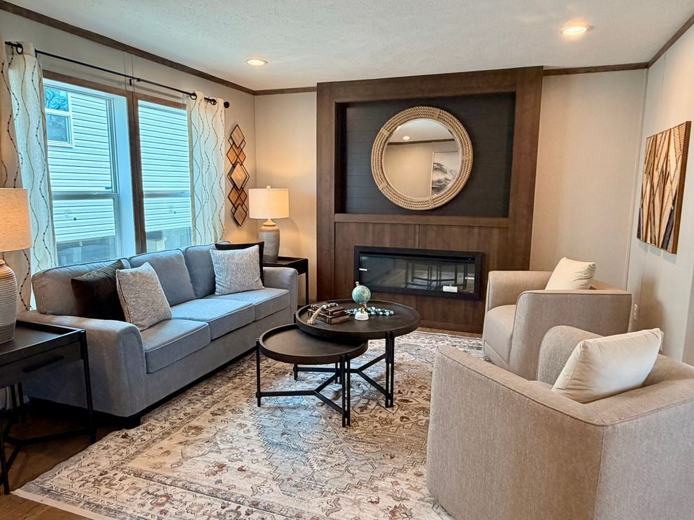The APATITE Living Room. This Manufactured Mobile Home features 3 bedrooms and 2 baths.