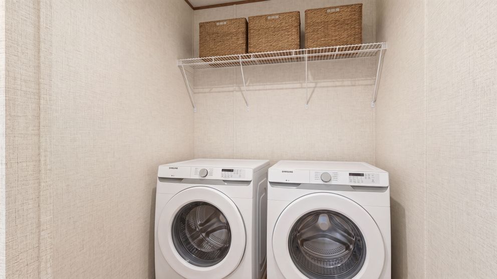 The BIRCH Utility Room. This Manufactured Mobile Home features 3 bedrooms and 2 baths.