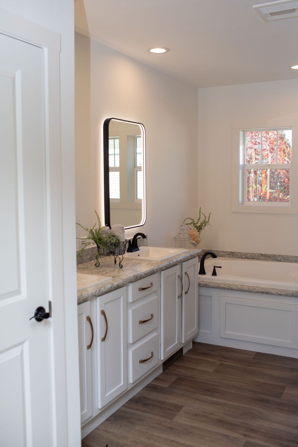 The ENCORE Primary Bathroom. This Manufactured Mobile Home features 3 bedrooms and 2 baths.