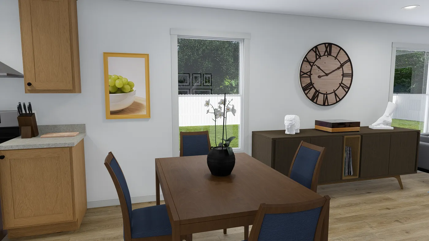 The PURPLE RAIN 5624 TEMPO SECT Dining Area. This Manufactured Mobile Home features 3 bedrooms and 2 baths.