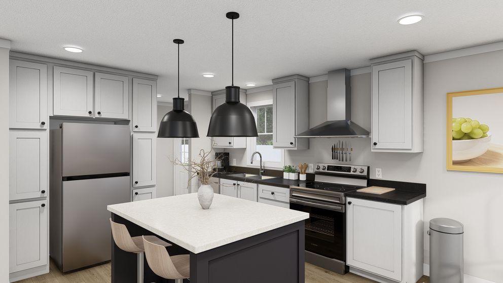 The THREE LITTLE BIRDS Kitchen. This Manufactured Mobile Home features 3 bedrooms and 2 baths.