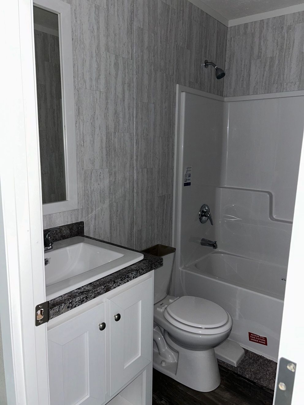 The SAPPHIRE XL 8016-644 Guest Bathroom. This Manufactured Mobile Home features 3 bedrooms and 2 baths.