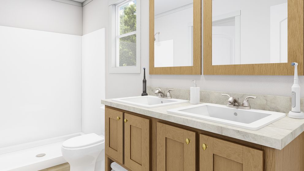 The RISING SUN Primary Bathroom. This Manufactured Mobile Home features 2 bedrooms and 2 baths.