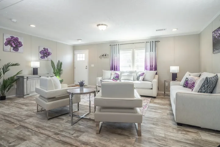 The STELLA Living Room. This Manufactured Mobile Home features 3 bedrooms and 2 baths.