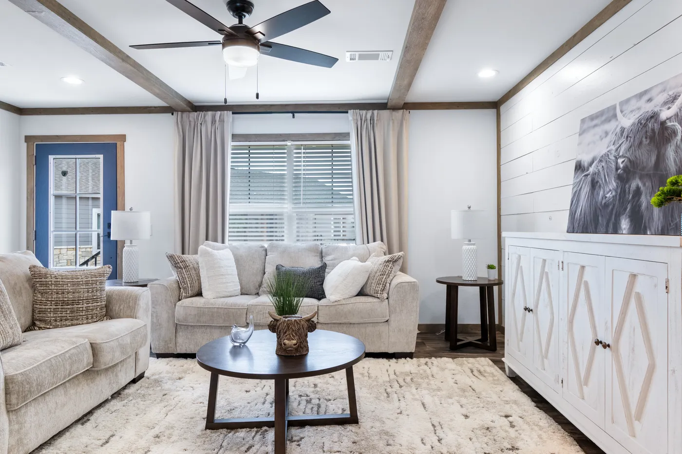 The SAWYER ELITE Living Room. This Manufactured Mobile Home features 3 bedrooms and 2 baths.