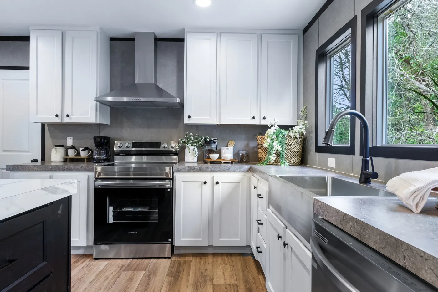 The ABSOLUTE VALUE Kitchen. This Manufactured Mobile Home features 4 bedrooms and 2 baths.