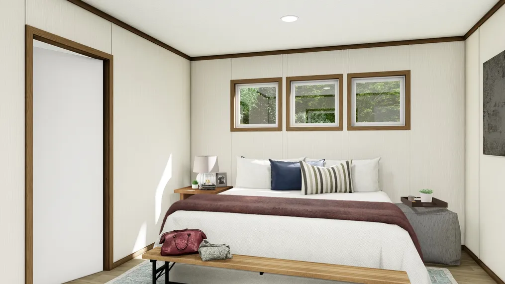 The DESIRE Primary Bedroom. This Manufactured Mobile Home features 3 bedrooms and 2 baths.