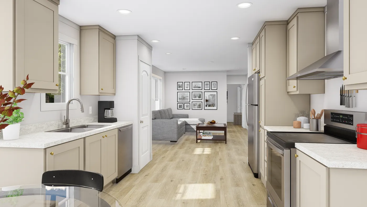 The HERE COMES THE SUN Kitchen. This Manufactured Mobile Home features 3 bedrooms and 2 baths.