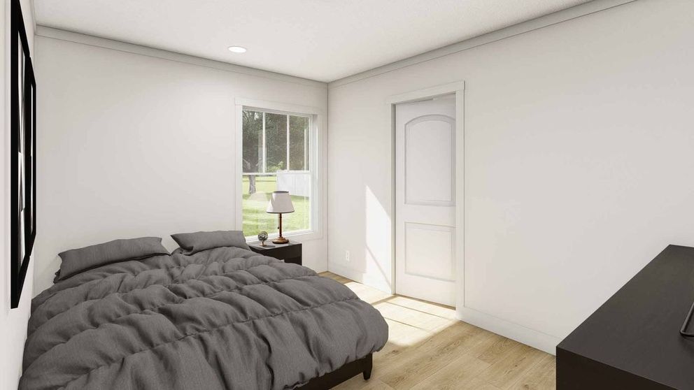 The GOOD VIBRATIONS Primary Bathroom. This Manufactured Mobile Home features 3 bedrooms and 2 baths.