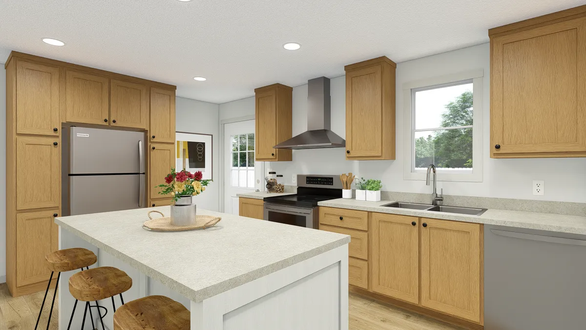 The ABBEY ROAD Kitchen. This Manufactured Mobile Home features 3 bedrooms and 2 baths.