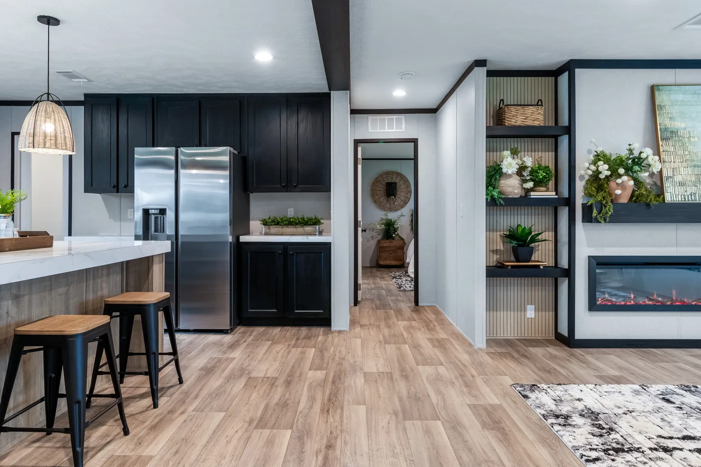 The ODYSSEY Living Room. This Manufactured Mobile Home features 4 bedrooms and 2 baths.
