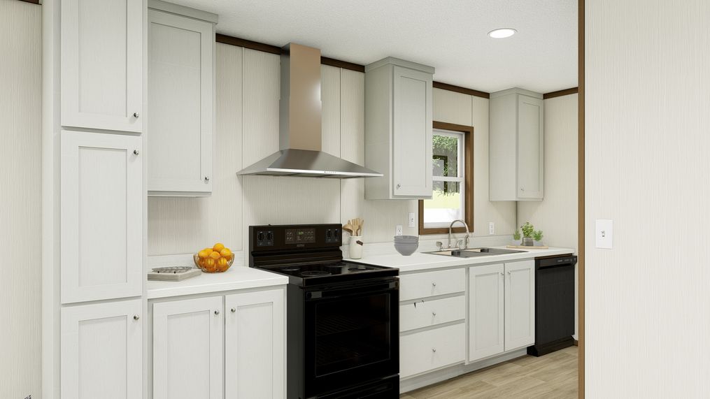 The DESIRE Kitchen - White. This Manufactured Mobile Home features 3 bedrooms and 2 baths.