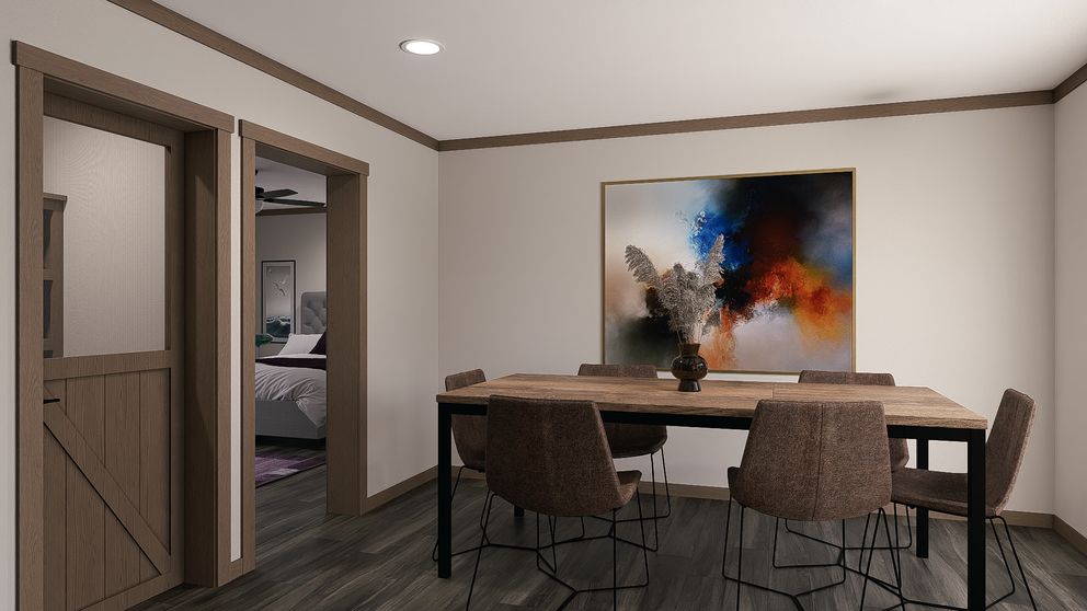 The NELLIE Dining Room. This Manufactured Mobile Home features 4 bedrooms and 2 baths.