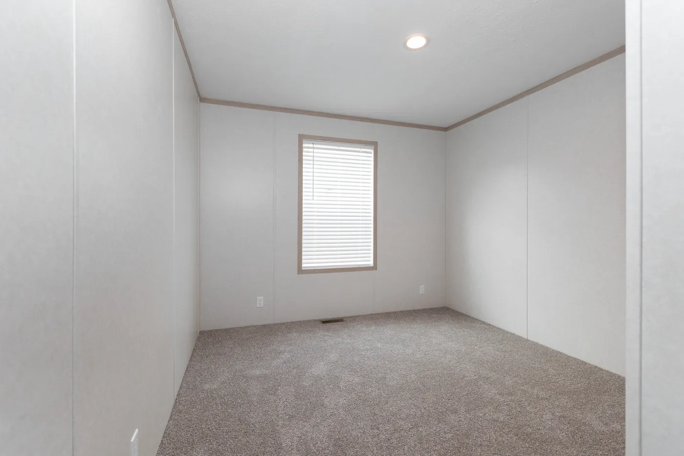 The 5628-5202 ADRENALINE Guest Bedroom. This Manufactured Mobile Home features 3 bedrooms and 2 baths.